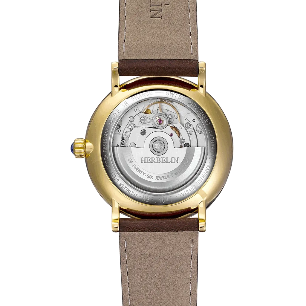 Herbelin Inspiration – elegant sveitsisk automatisk klokke med brun urskive og brun lærrem, klassisk design som passer til både jobb og formelle anledninger.