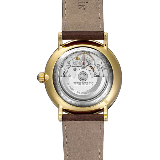 Herbelin Inspiration – elegant sveitsisk automatisk klokke med brun urskive og brun lærrem, klassisk design som passer til både jobb og formelle anledninger.