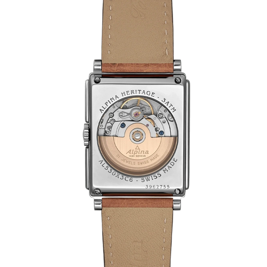 Alpina Heritage Carree Automatic 140 Years rektangulær herreklokke med lys tallskive, kasse i stål og rem av strutseskinn.
