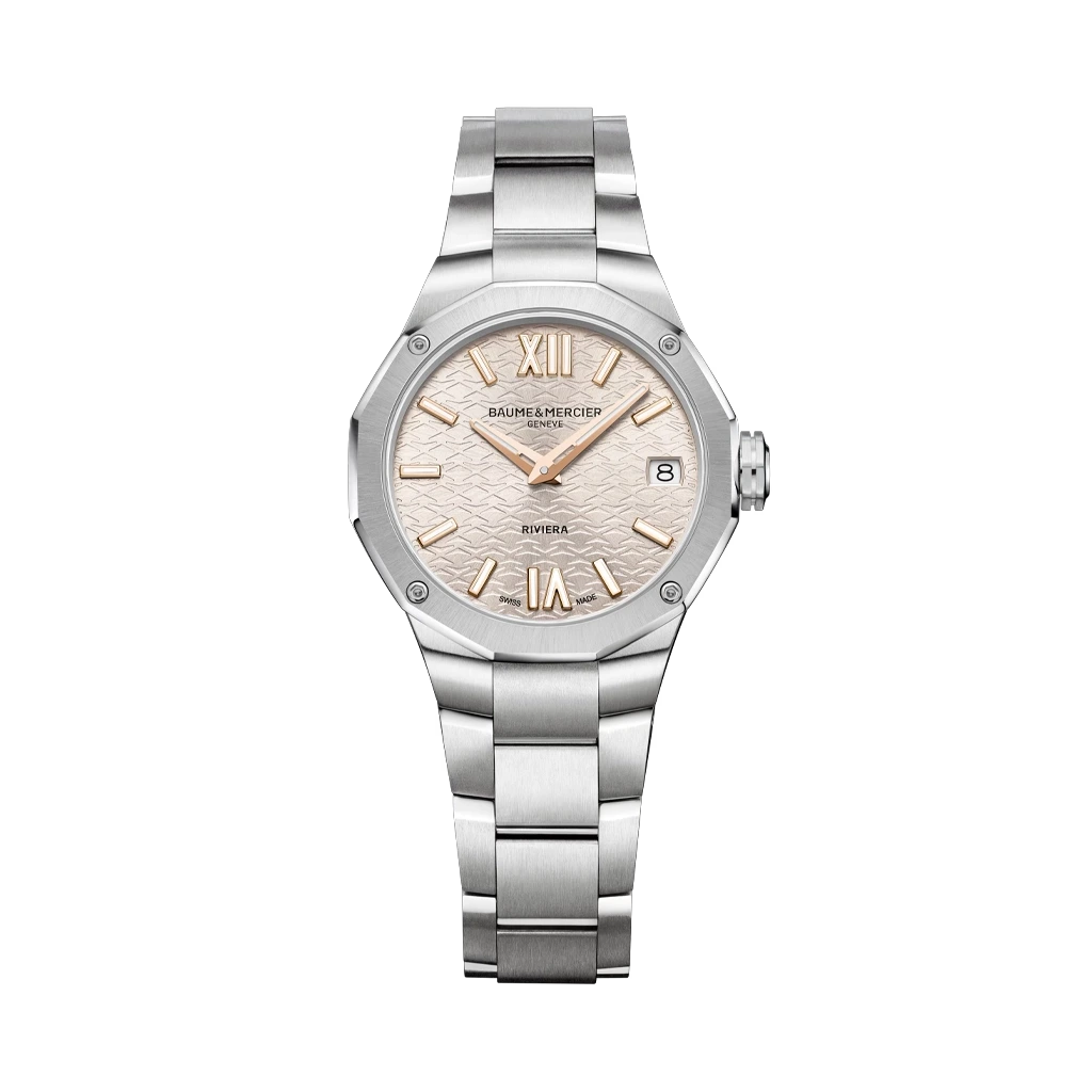 Baume & Mercier Rivera dameklokke med quartzverk på 33 mm. Kasse og lenke i stål, og en champagnefarget skive. 50 meter vanntett.