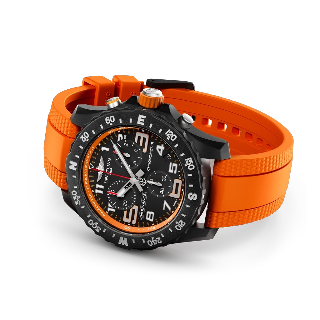 Breitling Endurance Pro 44 mm X82310A51B1S2 herreklokke med sort kasse i Breitlight, sort skive og oransje gummirem