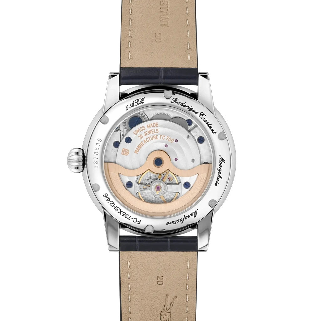 Frederique Constant Classic Power Reserve Big Date Manufacture pent herreur med månefase, gangreserveindikator og dato på skiven.