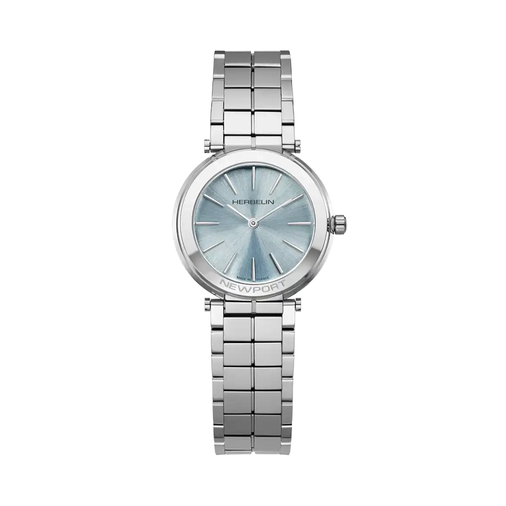Herbelin Newport Slim er en slank quartzklokke med stålkasse og safirglass og lyseblå skrive. 30 meter vanntett.