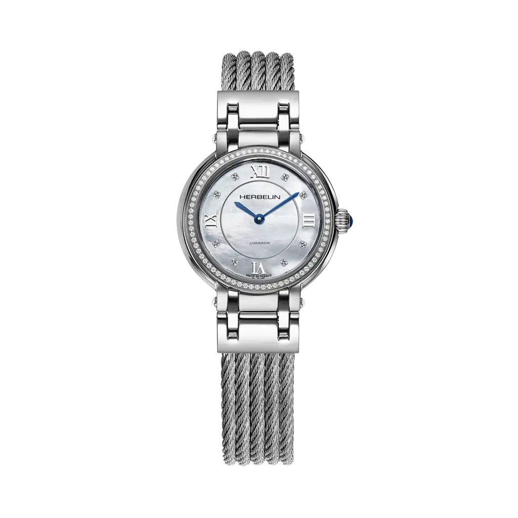 Lekker dameklokke på 28 mm med hvit perlemorskive og diamanter. Kassen i stål huser et quartzverk med time- og minuttviser. 50 meter vanntett.