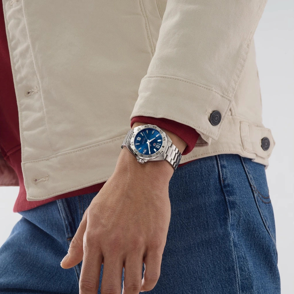 TAG Heuer Formula 1 WAZ1118.BA0875 til herre med kasse og lenke i stål og blå skive.