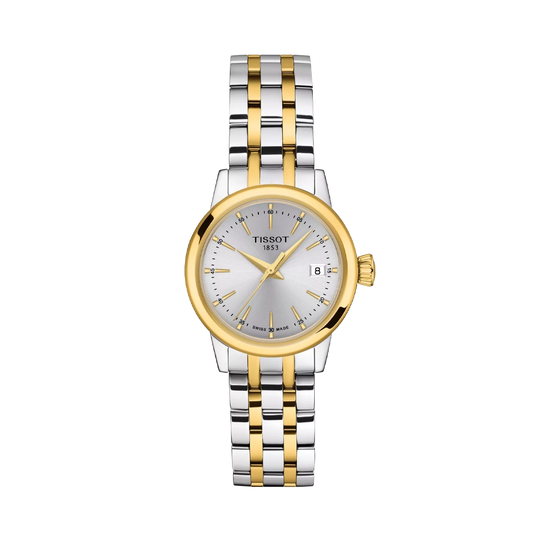 Tissot Classic Dream er en dameklokke på 28 mm. Klokken i tofarget stål har en grå tallskive med dato kl 3 og butterfly clasp. 50 meter vanntett.