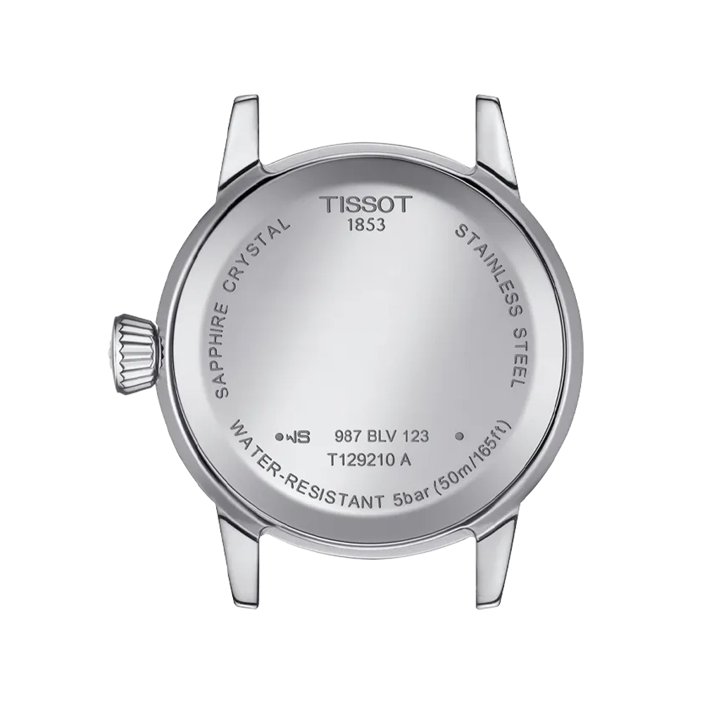 Tissot Classic Dream er en dameklokke på 28 mm. Klokken i stål har en grå tallskive med dato kl 3. Lenken i stål har butterfly clasp. 50 meter vanntett.