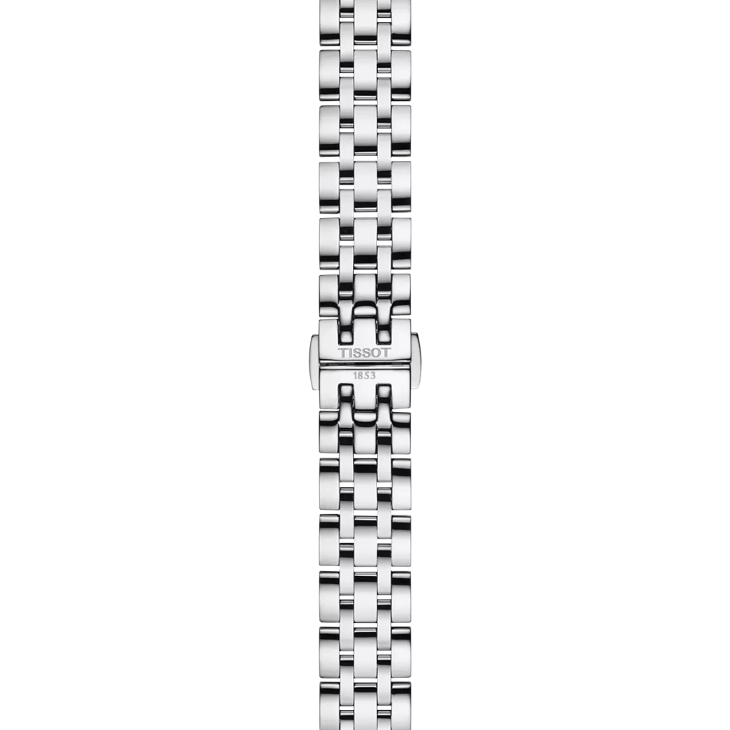 Tissot Classic Dream er en dameklokke på 28 mm. Klokken i stål har en grå tallskive med dato kl 3. Lenken i stål har butterfly clasp. 50 meter vanntett.