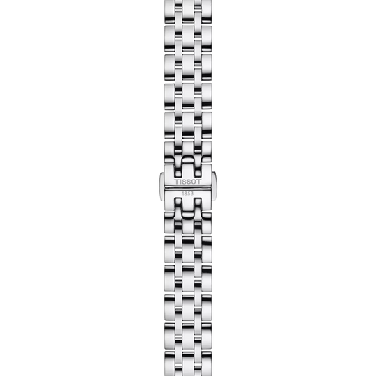 Tissot Classic Dream er en dameklokke på 28 mm. Klokken i stål har en grå tallskive med dato kl 3. Lenken i stål har butterfly clasp. 50 meter vanntett.